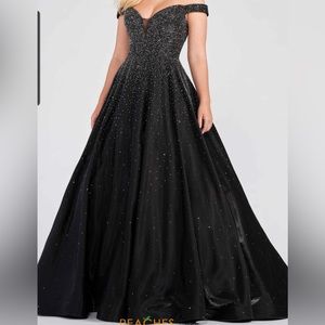 Mom Cheri princess black pageant gown.